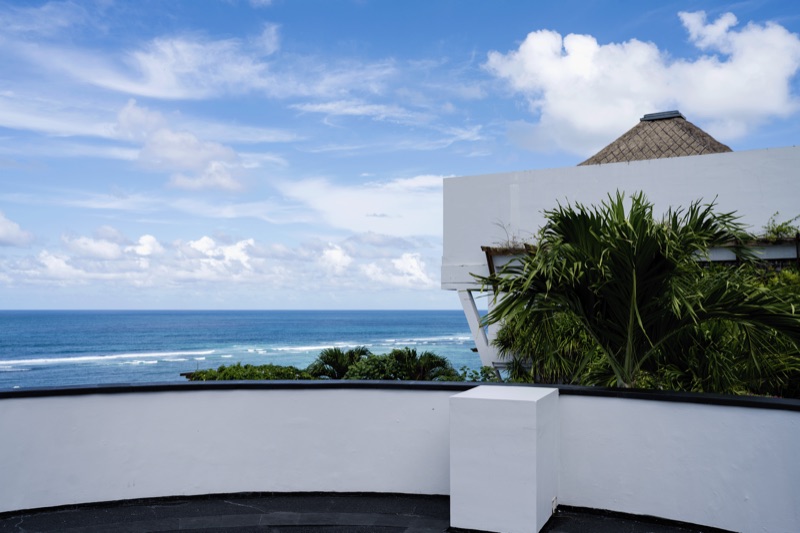 Modern white resort architecture with ocean view